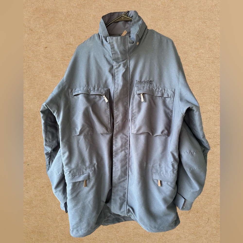 Men's Timberland insulated waterproof jacket. Size Small, Grayish blue.